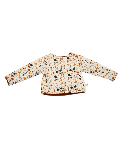 gilet reversible en coton bio exterieur cognac, doubluremotif terrazzo bébé